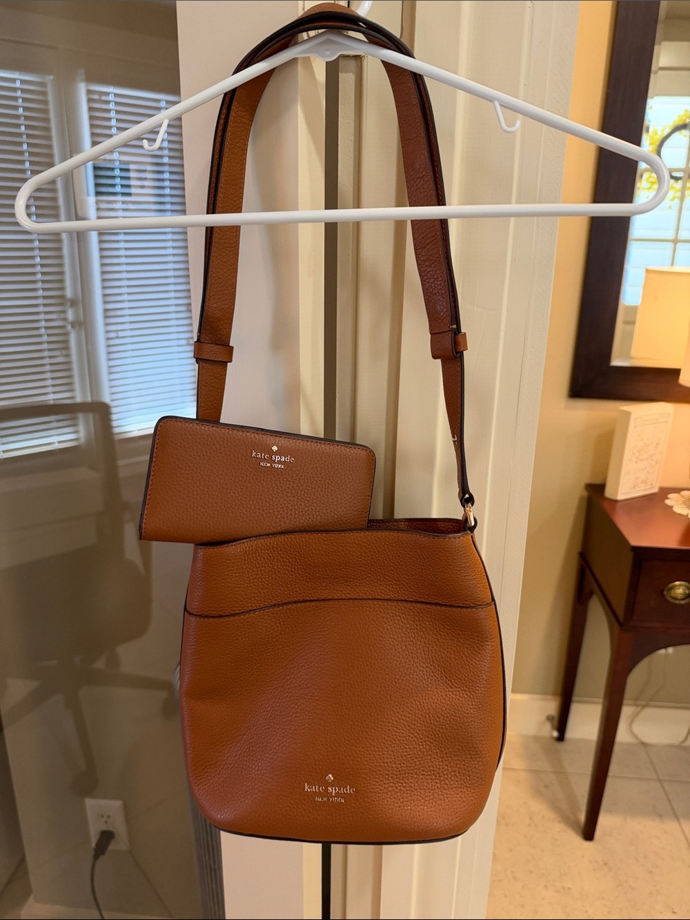 kate spade pebbled leather shoulder bag in cognac brown with matching wallet.